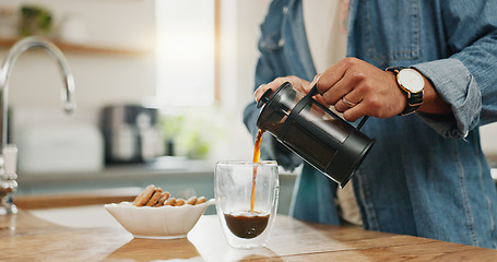 Image showing Hands, pouring coffee and breakfast in home kitchen, energy and start morning with warm matcha at table. Man, filter kettle and french press plunger for fresh organic caffeine at house for hot drink
