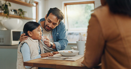 Image showing Parents, children and a girl eating spaghetti with her family in the dining room of their home together for supper. Food, kids and father around a table for a meal, bonding over dinner in a house