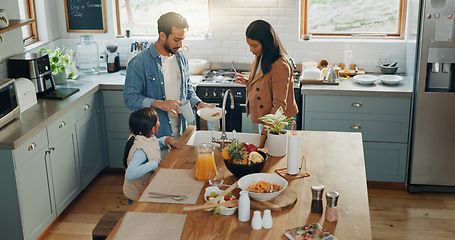 Image showing Family cleaning after breakfast, food and nutrition with hygiene, parents and child in kitchen together. Bonding, health and wellness, clean dishes and man, woman and girl kid in kitchen at home