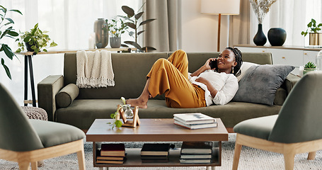 Image showing Phone call, laugh and black woman on sofa for talking, funny conversation and online discussion. Networking, communication and person relax on smartphone with humor, joke and comedy chat in home