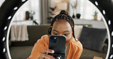 Image showing Video, content creator and black woman doing skincare for tutorial on social media or the internet. Dermatology, happy and African female influencer filming or live streaming face routine at home.