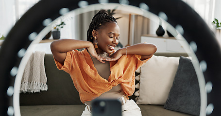 Image showing Smile, live streaming and black woman with serum for beauty and open skincare box. Happy, influencer and cosmetics, review product and content creation on social media, ring light and phone at home