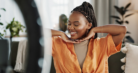 Image showing Smile, live streaming and black woman with serum for beauty and open skincare box. Happy, influencer and cosmetics, review product and content creation on social media, ring light and phone at home