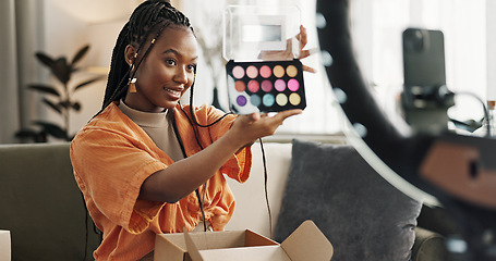 Image showing Video, content creator and black woman doing makeup for tutorial on social media or internet. Cosmetic, happy and young African female influencer film or live stream face cosmetology routine at home.