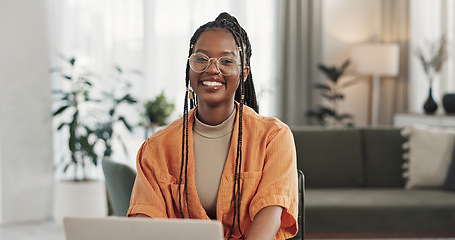 Image showing Black woman, portrait in home office and laptop for remote work, social media or blog research with smile in apartment. Happy freelancer at desk with computer for email, website or online in house.