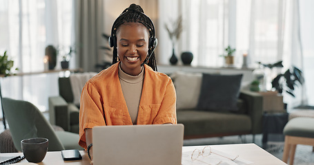 Image showing Black woman, headset with laptop and phone call, virtual assistant or crm in home office. Remote work girl at desk with computer, typing and conversation for advice, online chat and help in apartment
