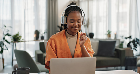 Image showing Laptop, dancing and young woman in the living room listening to music, album or radio of apartment. Technology, smile and young African female person streaming a song on a computer in lounge at home.