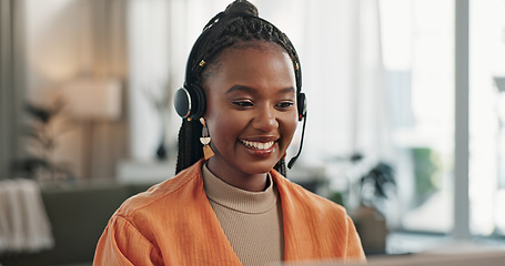 Image showing Black woman, virtual assistant in home office with laptop and phone call, remote work and crm in apartment. Girl at desk with computer, headset and conversation for advice, online chat and support.