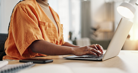 Image showing Black woman with laptop, typing and remote work in social media, blog post or online research in home office. Freelancer at desk with computer with email, website review or writing article in house.