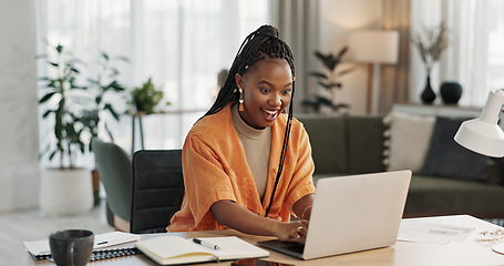 Image showing Black woman, typing in home office and laptop for research in remote work, social media or blog in apartment. Freelance girl at desk with computer writing email, website post and online chat in house