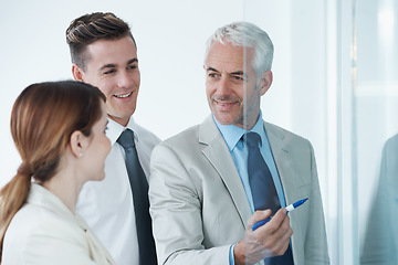 Image showing Glass wall, accountant or business people with planning, conversation or brainstorming with a project. Solution, group or manager with employees or teaching with ideas or cooperation with partnership