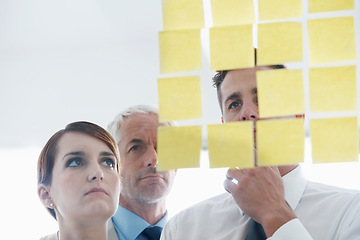 Image showing Team, sticky notes and glass wall for planning, thinking and vision for logistics and ideas. Management, brainstorming and collaboration for meeting, goal and teamwork for discussion and marketing