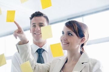 Image showing Business people, glass wall and sticky note for planning, brainstorming for a project and schedule. Staff, meeting and agency with a deadline or cooperation with startup or collaboration with ideas