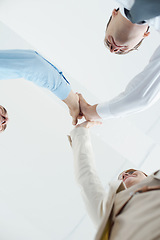 Image showing Hands, high five and low angle of people with success, celebration and support for achievement in teamwork. Business, collaboration and group with cooperation, solidarity and team building gesture