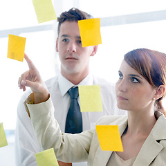 Image showing Business people, glass wall and sticky note for planning, meeting and brainstorming for a project. Staff, teamwork and agency with a deadline and cooperation with startup and collaboration for ideas