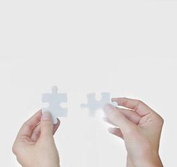 Image showing Puzzle, business and connection for collaboration, trust and teamwork for hope and goals. Hands, partnership and planning for company, solutions and vision for support, idea and investment with sun