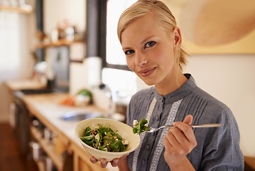 Image showing Woman, portrait and salad eating in kitchen or health nutrition for wellbeing, ingredients or fibre. Female person, face and bowl or vegetable meal in apartment for diet leafy greens, food or Canada