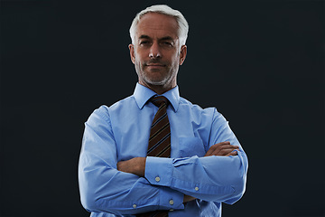 Image showing Senior, businessman and portrait or arms crossed in studio with confidence and pride for corporate career or job. Mature, entrepreneur and ceo with face, serious and contemplating on black background