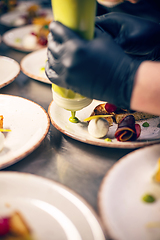 Image showing Chef finishing his plate