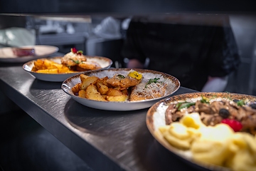 Image showing Restaurant counter with different lunch menu