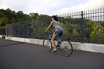 Image showing Woman on a Bike