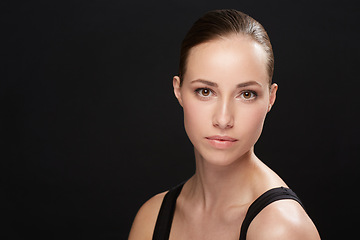 Image showing Studio, serious or beauty of woman in portrait, cosmetic or facial treatment on black background. Model, pride or make up in spa cosmetology for mockup space, retinol or collagen for skincare results