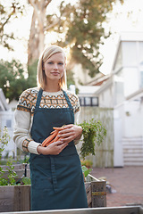 Image showing Gardening, carrot and portrait of woman with plants for landscaping, planting flowers and growth. Agriculture, nature and happy person with vegetables outdoors for environment, nursery and garden