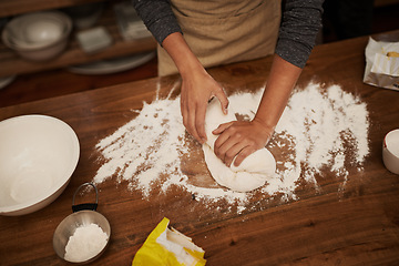 Image showing Hands, dough and flour on table in kitchen, bakery for bread or pizza with meal, catering and cooking. Culinary, chef or baker person with pastry preparation, ingredients and food for nutrition
