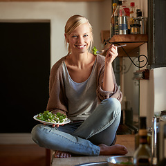 Image showing Woman, kitchen and diet with smile, portrait and home for nutrition, vegetables and salad. Designer, house and lunch for health, wellness and relaxation and closeup for wellbeing, rest and happiness