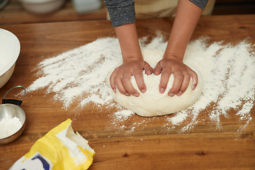 Image showing Hands, dough and flour on table at bakery, bread or pizza with meal prep, catering and cooking. Culinary experience, chef or baker person with pastry preparation, ingredients and food for nutrition