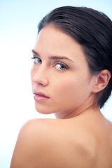 Image showing Health, skincare and portrait of woman in studio with beauty, cosmetic and face routine. Wellness, glow and confident young female person with facial salon dermatology treatment by blue background.