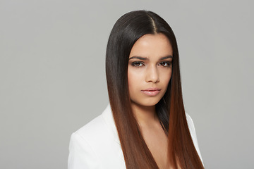 Image showing Portrait, beauty and hair with natural woman in studio isolated on gray background for shampoo treatment. Face, aesthetic and salon with confident young model at hairdresser for keratin haircare