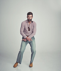 Image showing Vintage, fashion and portrait of man with 70s retro aesthetic in gray background of studio. Smoking, pipe and person dance with confidence in funky sunglasses, clothes and unique style from past