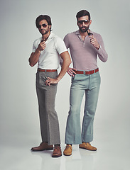 Image showing Vintage, men and sunglasses or pipe in studio with fashion model, hipster outfit or confidence with calm expression. Friends, people and attitude with 70s style or retro clothes with white background