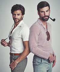 Image showing Vintage, men and portrait or pipe in studio with fashion model, hipster outfit and confidence with calm expression. Friends, people and attitude with 70s style or retro clothes with white background