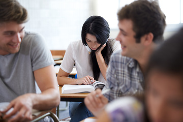 Image showing Students, books and reading in university class for education for academic exam for collage, scholarship or studying. Men, women and friends or lesson for course work or lecture, assignment or school