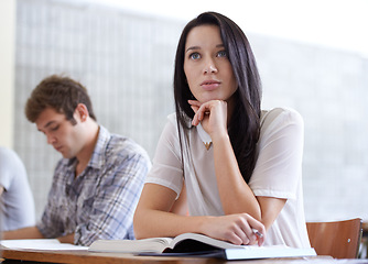 Image showing University, thinking and woman in lecture with books for development in learning, opportunity and future. Education, knowledge and growth for college student in classroom, studying for exam or test.