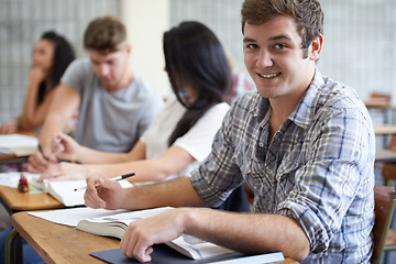 Image showing University, books and portrait of man in classroom with development in learning, opportunity and future. Education, knowledge and growth for college student in lecture, studying for exam or test.