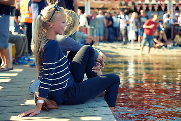 Image showing Women, festival and crowd for celebration, smile and fun with happiness, pond and water. Couple of friends, audience and nature with summer, texas and event or concert with party, people and music