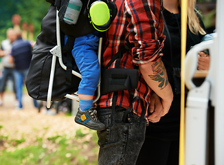 Image showing Man, child and woman in nature at music festival in woods, relax and family at carnival in outdoor. Father, kid and mother for bonding together on vacation and love in forest for social in community