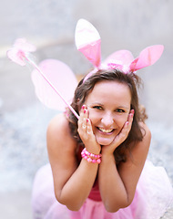 Image showing Portrait, outdoor and woman with bunny ears, fairy and party with Halloween outfit and social gathering. Face, person and girl with sunshine and weekend break with happiness and costumes with a smile
