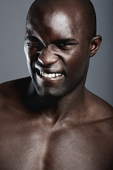 Image showing Skincare, health and portrait of black man in studio with wink and flirting facial expression. Spa, wellness and young African male person with clean face dermatology treatment by gray background.