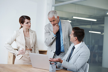 Image showing Laptop, conversation and business people in office for research on corporate legal project in collaboration. Team, technology and group of attorneys work on case with computer in workplace boardroom.