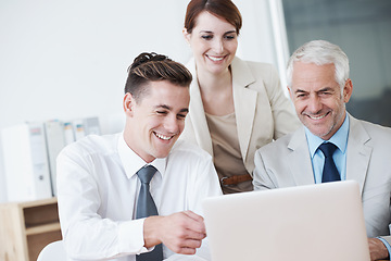 Image showing Computer, meeting and business people in discussion in office for corporate legal project. Conversation, technology and professional team of lawyers working on laptop by desk together in workplace.