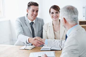 Image showing Shaking hands, happy business people or deal for partnership agreement or b2b offer in meeting. Handshake, smile or excited corporate lawyers in collaboration for teamwork with contract or paperwork