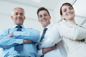 Image showing Pride, crossed arms and portrait of business people in office with positive, good and confident attitude. Happy, smile and team of lawyers in meeting for collaboration in workplace from below.