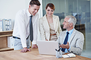 Image showing Business people, laptop and discussion for training in boardroom, communication and meeting in office. Senior manager, employees and tech for assistance in teaching, mentor and advice for support