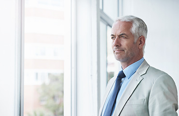 Image showing Mature, man and thinking about future of business at window, planning an idea for office. Professional, mindset and businessman remember a dream for company and consider decision, choice or solution