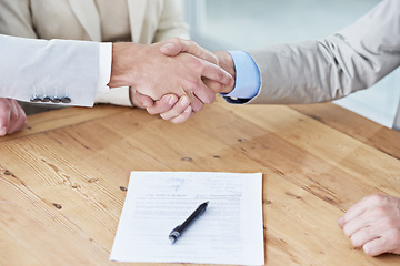 Image showing Handshake, business people and contract, onboarding with human resources, meeting or interview at office. Paperwork, cooperation and partnership with signature, hiring and shaking hands for welcome