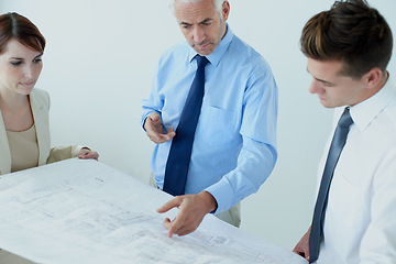 Image showing Blueprint, people or civil engineering team in office planning project, maintenance or renovation in meeting. Architecture, building or designers with floor plan for property development ideas